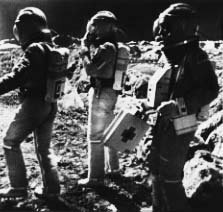 3 Spacesuited Figures on the Lunar Surface