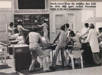 Caption: Shock-waves from the missiles that blew the alien ship apart wracked Moonbase Alpha to it's very foundation!, Picture: Main Mission staff hanging on for their lives