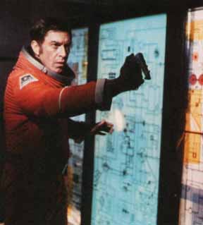 Commander Koenig in Spacesuit Shooting Laser