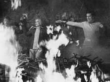 Alan, Helena and John being burned at the stake